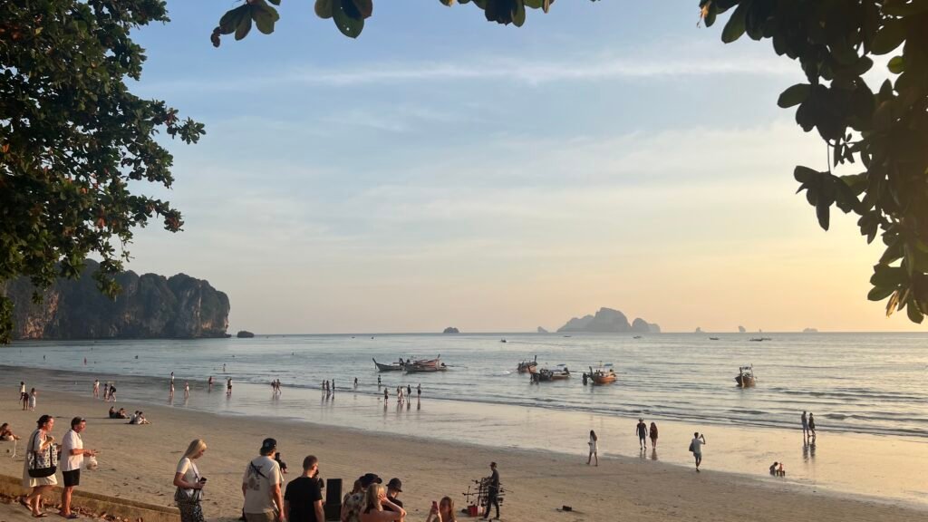 Ao nang beach in Krabi, Thailand. a view of the sunset and surrounding islands off the coast of ao nang
hidden gem destinations
